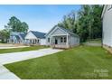 New single Gathering construction with sidewalk and street view in residential neighborhood at 602 Meadow Ave, Spencer, NC 28159