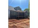 Rear exterior of home with new siding and covered porch under construction at 552 Fern Hill Rd # 21, Mooresville, NC 28117