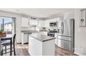 Modern kitchen with stainless steel appliances and island at 1197 Tangle Ridge Se Dr, Concord, NC 28025