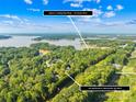 Aerial view showcasing the property's waterfront proximity at 141 Red Brook Ln, Mooresville, NC 28117