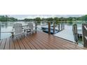 Relaxing dockside seating with lake views and access to water activities at 165 Woodstream Cir, Mooresville, NC 28117