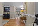 Bright entryway with hardwood floors and built-in cabinetry at 17929 Pages Pond Ct, Davidson, NC 28036