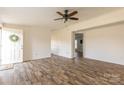 Bright living room with hardwood floors and ceiling fan at 1520 Yellowstone Ct, Gastonia, NC 28054