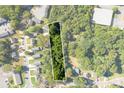Aerial view of a rectangular lot, surrounded by houses and trees at 3444 Marvin Rd, Charlotte, NC 28211