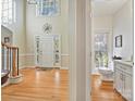 Bright and spacious foyer with hardwood floors and powder room at 3481 Fieldstone Dr, Gastonia, NC 28056
