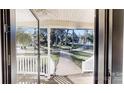 Inviting walkway with lush lawn and mature trees, as seen from the front door at 1000 Hunting Ave, Lincolnton, NC 28092