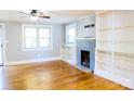 Bright living room featuring hardwood floors and a fireplace at 1350 8Th Nw St, Hickory, NC 28601