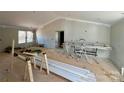 Unfinished living room with high ceilings and lots of natural light at 99 Wilson Ln # 3, Taylorsville, NC 28681