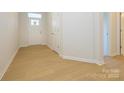 Light and bright foyer with wood-look flooring at 10105 Mamillion Dr, Huntersville, NC 28078