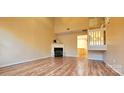 Living room with hardwood floors and fireplace at 10105 Reindeer Way Ln, Charlotte, NC 28216