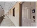 Hallway showing unit 502 with secure entry system and access to the building's common area at 211 Heritage Blvd # 502, Fort Mill, SC 29715
