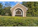 Kensington brick and stone monument sign surrounded by greenery, marking the entrance to the community at 211 Heritage Blvd # 502, Fort Mill, SC 29715
