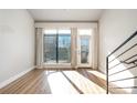 Bright living room with large windows and city views at 115 E Park Ave # 419, Charlotte, NC 28203