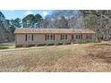 Cozy one story home with red door and shutters surrounded by nature at 539 Rockwell Cir, Rock Hill, SC 29730