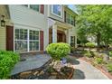 Charming home with well-maintained landscaping and inviting front porch exudes curb appeal at 3007 Gambrill Falls Dr, Indian Trail, NC 28079
