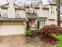 Two-story house with attached garage and manicured lawn at 501 River Oaks Ln, Charlotte, NC 28226