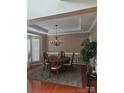 Formal dining room featuring hardwood floors and a chandelier at 13123 Ashley Meadow Dr, Charlotte, NC 28213