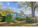 Brick home with teal shutters and lush landscaping at 1924 Lakeview Dr, Rock Hill, SC 29732