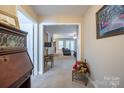 Inviting hallway leads to a cozy living area and the rest of the home at 5039 Penn Rd, Iron Station, NC 28080