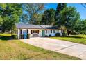 Cute ranch home with a landscaped yard and spacious driveway at 1378 8Th Nw St, Hickory, NC 28601