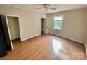 Simple bedroom with hardwood floors and closet at 807 Phillips Dr, Kings Mountain, NC 28086