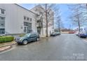 Street view of modern building with parking and nearby trees at 929 Westmere Ave, Charlotte, NC 28208