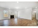 Spacious basement with hardwood floors and a fireplace at 5226 Verona Rd # 81, Charlotte, NC 28213