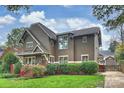 Two-story Craftsman home with a driveway and landscaped front yard at 2526 Normandy Rd, Charlotte, NC 28209