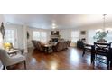 Open living room and dining area with a stone fireplace at 107 Ivan Ln, Lincolnton, NC 28092