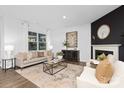 Elegant living room with a fireplace, neutral furniture, stylish rug, and plenty of natural light at 3865 Maxwell Henry Nw Ln, Conover, NC 28613
