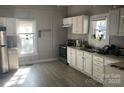 Bright kitchen featuring ample counter space, modern appliances, and sun-drenched windows at 322 S Liberty St, Gastonia, NC 28052