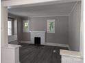 Living room showcasing modern flooring, a cozy fireplace, and neutral paint palette at 602 W Council St, Salisbury, NC 28144