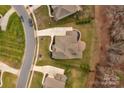 Aerial view showcasing the home's layout and surrounding landscape at 2714 Stonewood Vw, Kannapolis, NC 28081