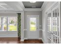 Bright entryway with hardwood floors, white trim and french doors at 2714 Stonewood Vw, Kannapolis, NC 28081