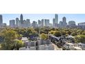 Aerial view showing home and surrounding cityscape at 916-A Westbrook Dr, Charlotte, NC 28202