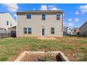 Large backyard with a patio and garden space at 173 Hidden Lakes Rd, Statesville, NC 28677
