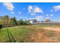 Fenced backyard offering ample space and privacy at 173 Hidden Lakes Rd, Statesville, NC 28677