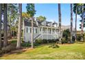 Two-story house with a wraparound porch and landscaping at 806 Lake Mist Dr, Stanley, NC 28164