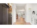 Bright entryway with hardwood floors, view to living area at 3878 Fairlady Ln, Fort Mill, SC 29707