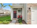 Inviting front entrance with wreath, bench, and landscaping at 3878 Fairlady Ln, Fort Mill, SC 29707