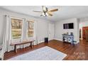 Living room with hardwood floors and wood bench at 797 Chief Thomas Rd, Harmony, NC 28634