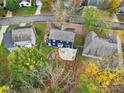 Aerial view showing house, backyard patio, and neighboring homes at 6934 Spring Morning Ln, Charlotte, NC 28227