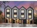 Three modern townhouses with attached garages and stylish exterior at 158 Mattoon St, Charlotte, NC 28216