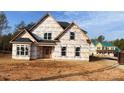 New home under construction featuring a classic design, large windows, and a gabled roof at 227 Heartland Dr, Rock Hill, SC 29732