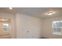 Simple bedroom with carpet, neutral walls and a large window at 3540 Nimbell Rd, Monroe, NC 28110