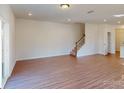 Spacious living room with hardwood floors and access to backyard at 3543 Nimbell Rd, Monroe, NC 28110