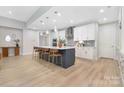 Beautiful kitchen with stainless steel appliances, island with barstool seating, and ample cabinet space at 3067 Trace Meadow Ct, York, SC 29745