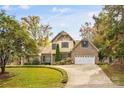 Two-story home with a two-car garage and manicured lawn at 119 42Nd Avenue Nw Dr, Hickory, NC 28601