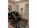Cozy office features a modern desk and a stylish black and white patterned rug for a professional workspace at 129 Johnson Manor St, Mooresville, NC 28115