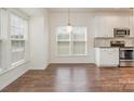 Bright kitchen with hardwood floors and stainless steel appliances at 105 Beverly Chase Ln, Mooresville, NC 28117